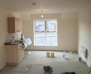 Interior electrics, plumbing and decorating well underway.